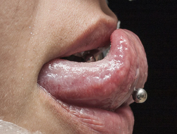 Girl with Tongue Piercing