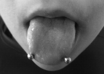 Snake Eye Tongue Piercing